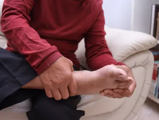 Close up feet of senior man
