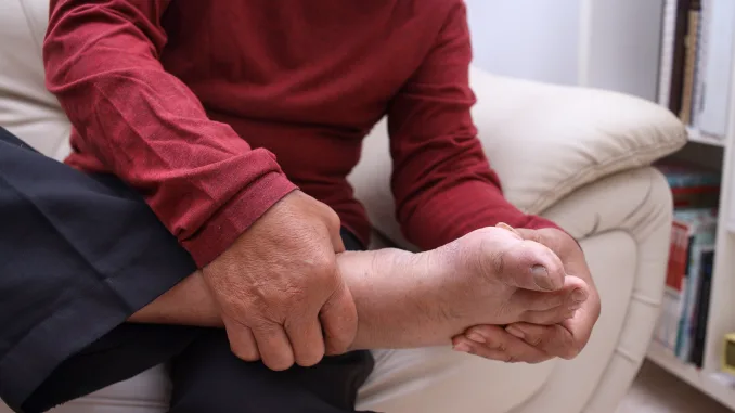 Close up feet of senior man