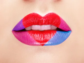 Lips painted with a lipstick heart