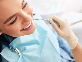 Close up of pleased woman that being at dentistry